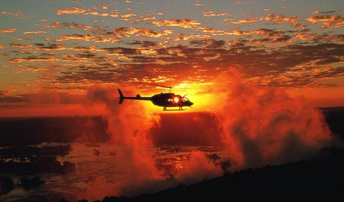 Helicopter flying over Victoria Falls - Zimbabwe